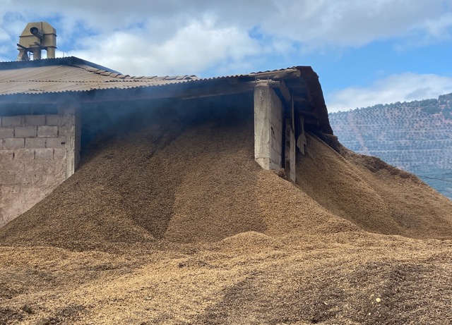 An agro-processing facility swamped with coffee husk in Minas Gerais, Brazil.